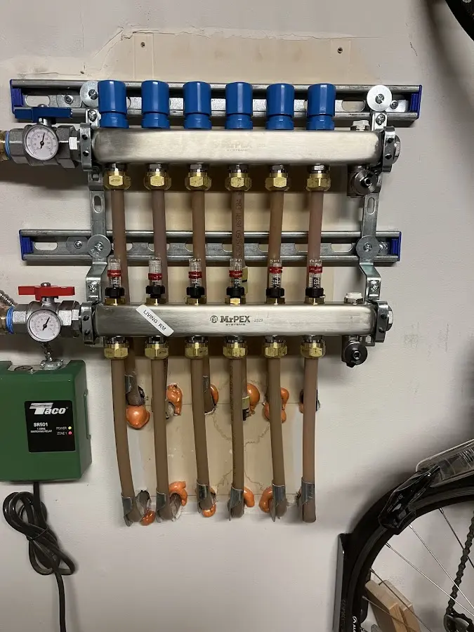 Plumber performing Gas Line Installation at a residential property in Rib Mountain